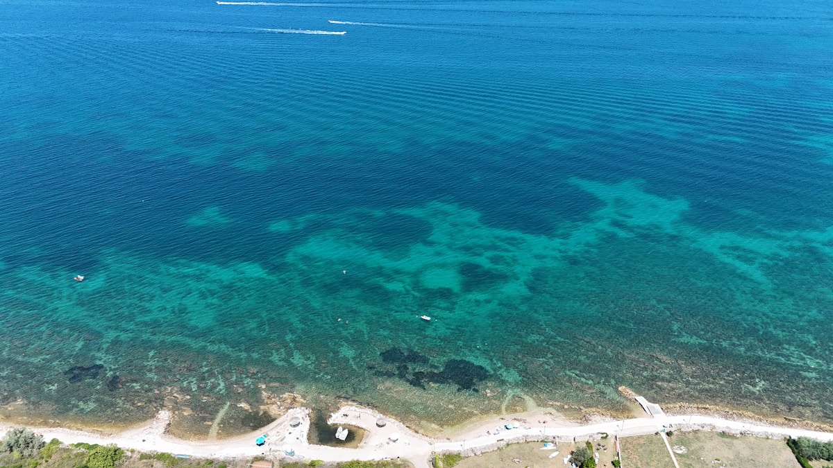 Cleopatra Beach in Alanya — fine sand backed by the castle peninsula